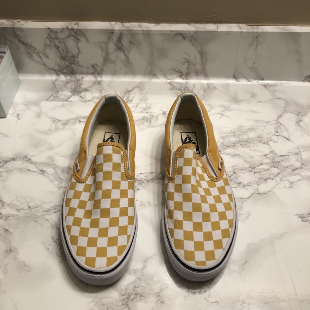 Goldish yellow checkered slip-on vans